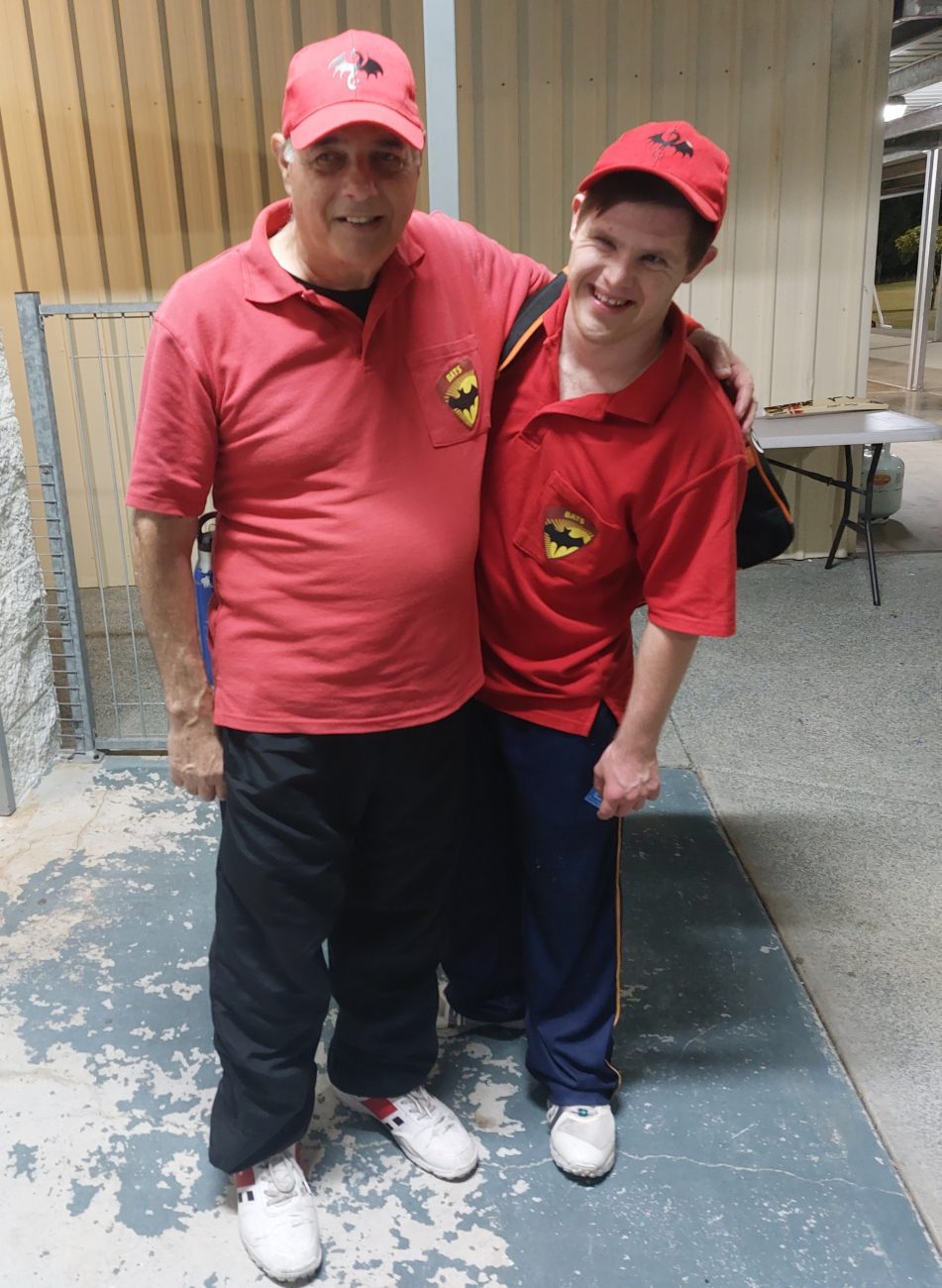 Photo of President Paul Szep and new member Shai Mayberry in their red Draons uniform
