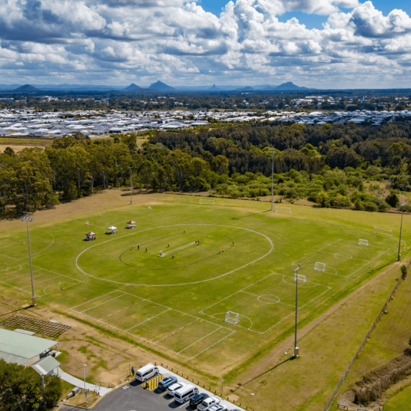 A Sports Complex line-marked as half sized fiiels/courts for the following activies: Hockey, Sofball, Netball, Touch Football, Soccer, and Beep Cricket