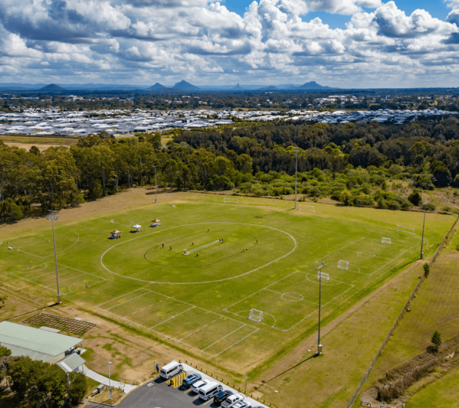 A Sports Complex line-marked as half sized fiiels/courts for the following activies: Hockey, Sofball, Netball, Touch Football, Soccer, and Beep Cricket