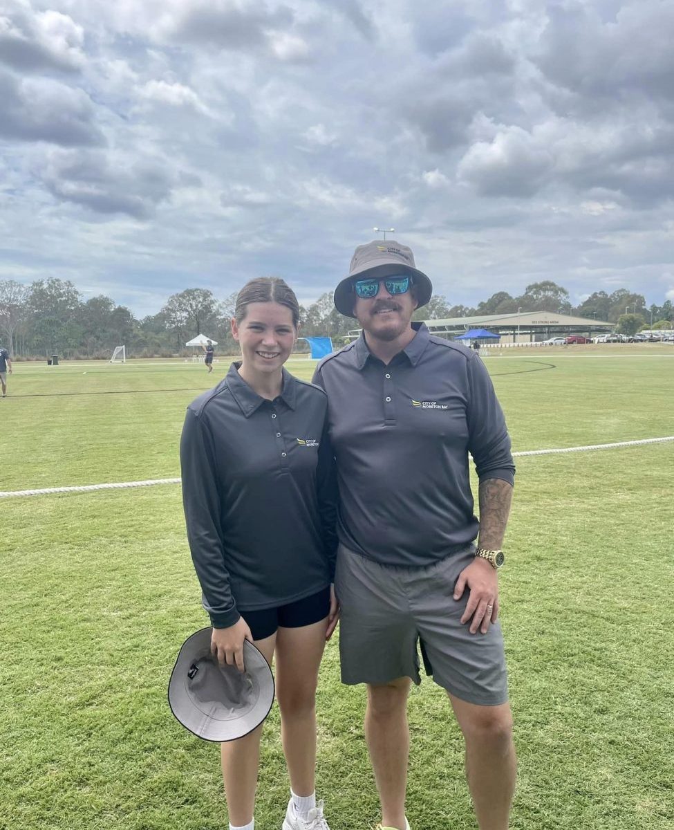 Photo of Cr Mark Booth and daughter Cleo, members of the Mayor's XI team